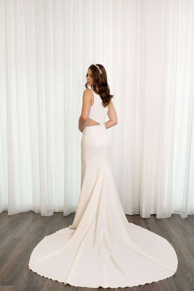 Elegant Fit-and-Flare Wedding Gown with Asymmetric Neckline