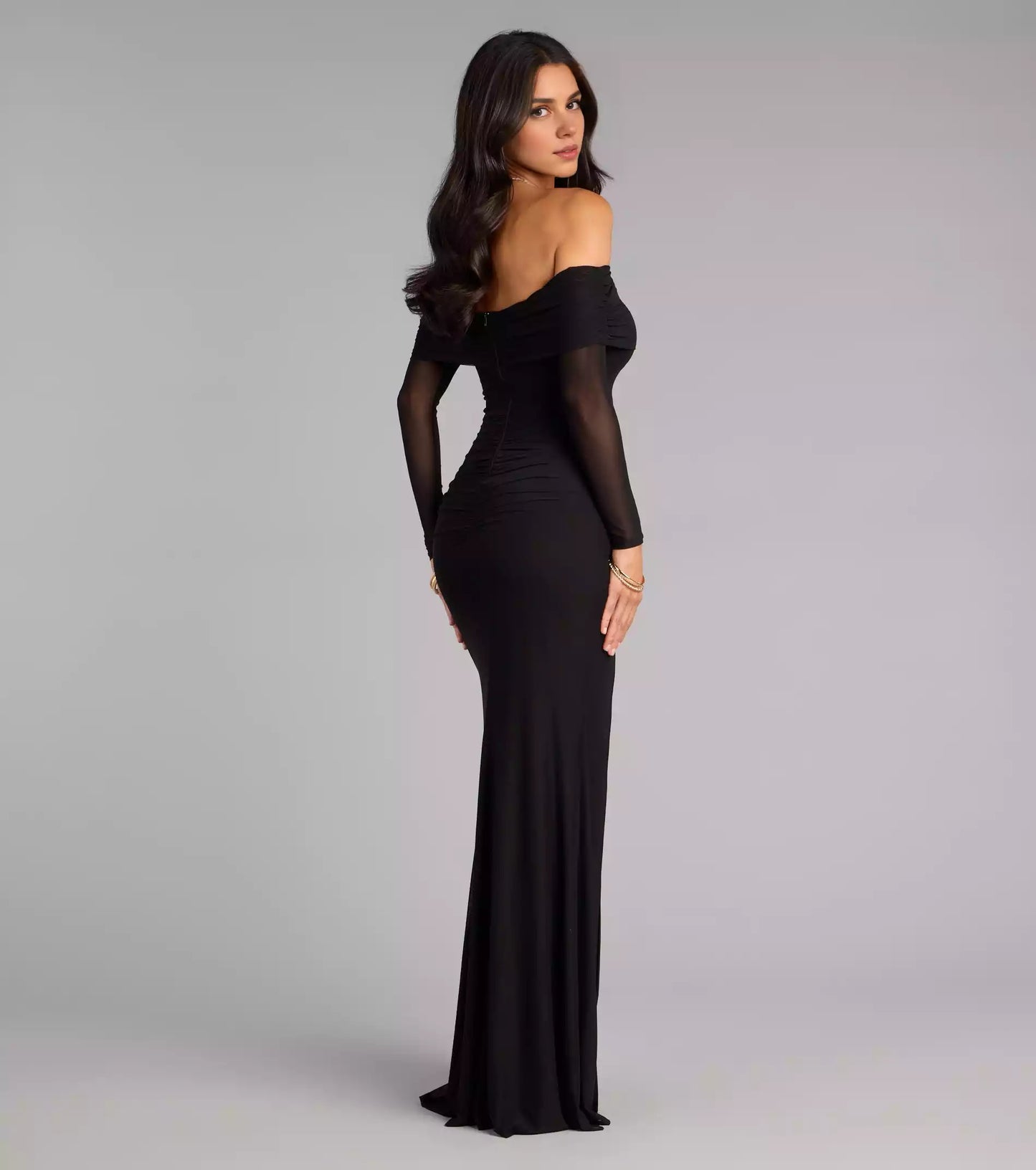 Stunning mesh knit lining with off shoulder neckline, slim fit long sleeves, high slit mermaid silhouette, and floor skirt Prom Dresses