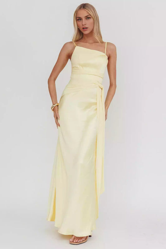 Elegant mesh details with knot embellishments at the waist and lining at the back with zippers Prom Dresses