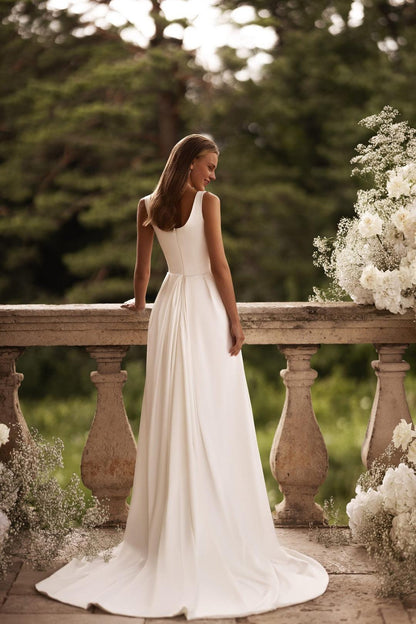 Elegant Ivory Satin Wedding Dress with Square Neck Accentuated Waist and Extended Train