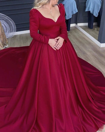 Long Sleeve Orange Satin V-neck Ball Gown Dresses