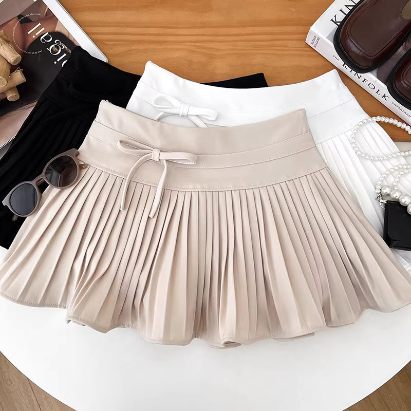 Sweet and youthful design, high-waisted, slimming, pleated midi skirt with a bow, anti-exposure, A-line skirt for women.  11447