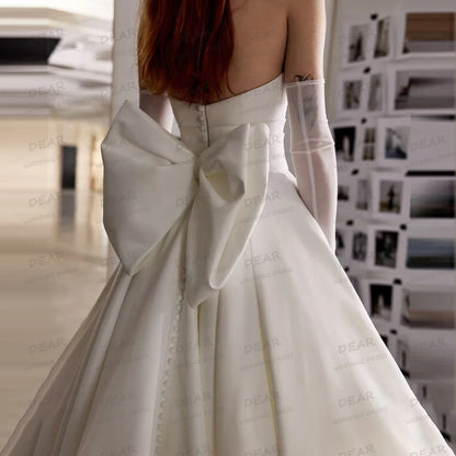 Graceful Simple Strapless A Line Wedding Dress Sleeveless Backless Bridal Gown with Bow