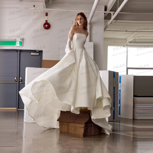 Graceful Simple Strapless A Line Wedding Dress Sleeveless Backless Bridal Gown with Bow