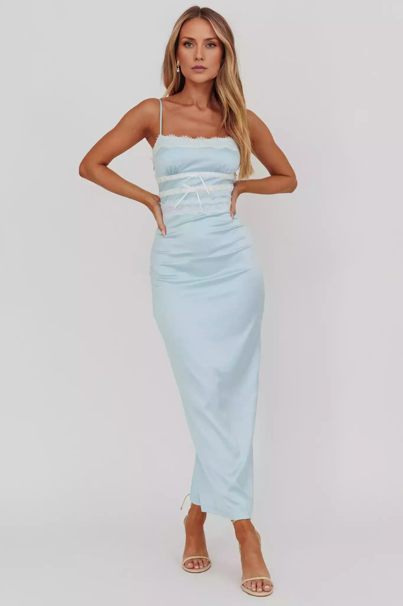 Stunning interior with adjustable thin shoulder straps and lace trim details. Back split side zipper Prom Dresses