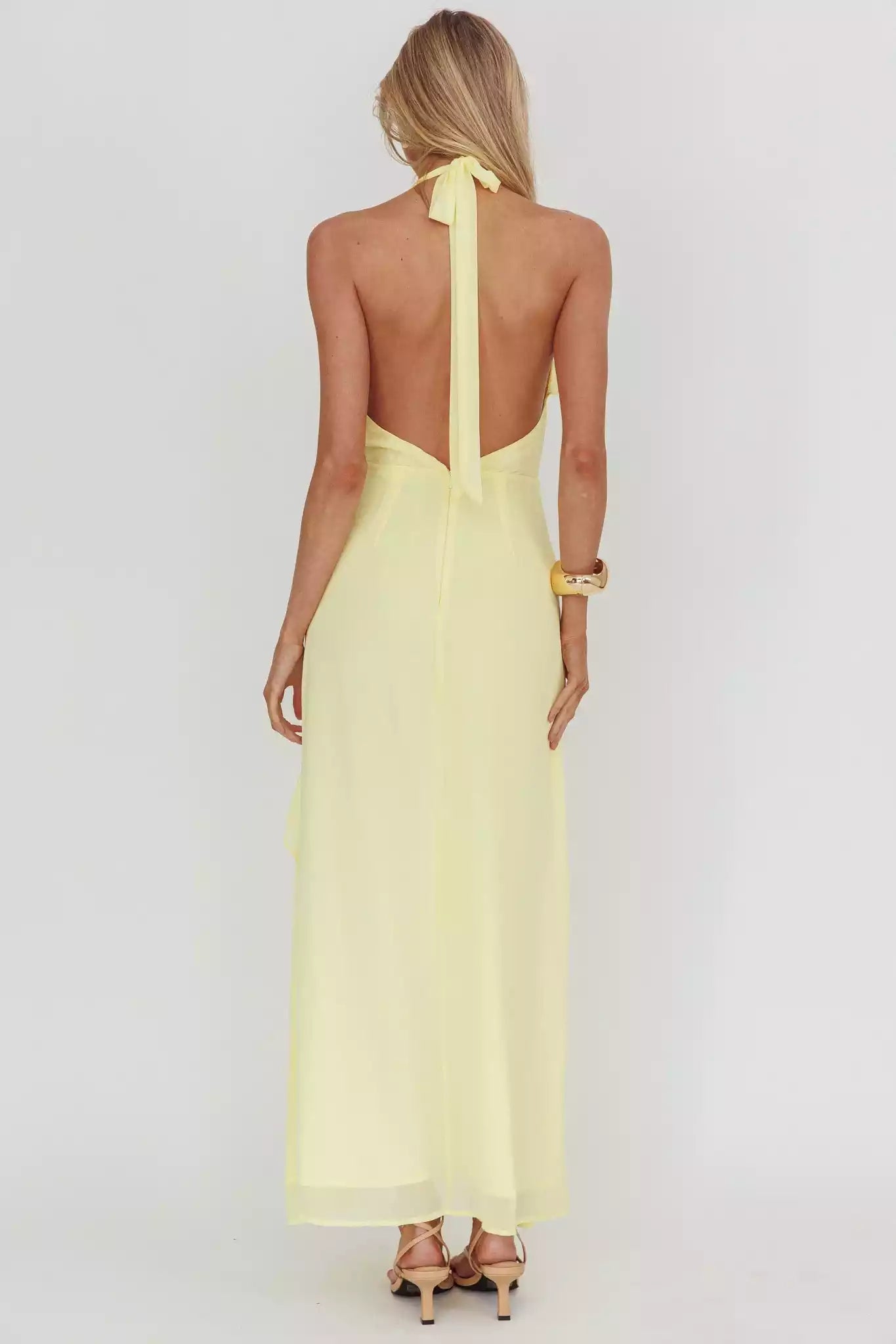 Stunning lining with backless ruffle details, front slit and back with zipper Prom Dresses