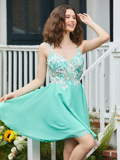 Appliqued Plunging V-Neck Pleated Mini Dress Spa