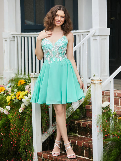 Appliqued Plunging V-Neck Pleated Mini Dress Spa
