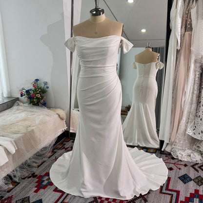 Pleated stretch crepe gown with White Wedding Dress Juliette sleeves