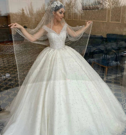 Elegant Off-the-Shoulder Backless Wedding Dress with Pearl Beading