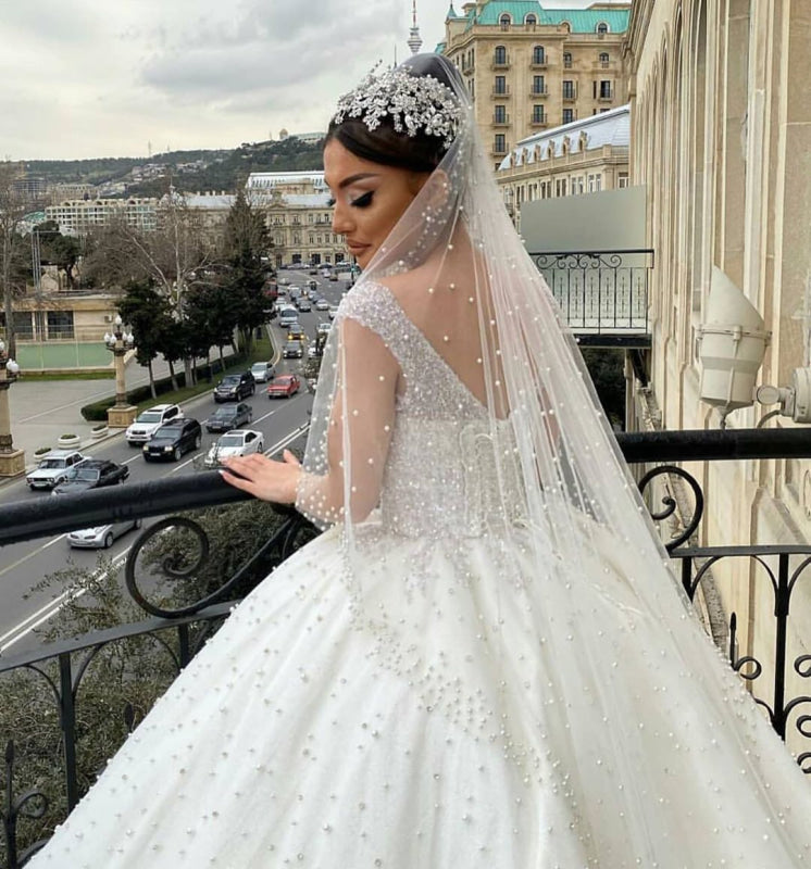Elegant Off-the-Shoulder Backless Wedding Dress with Pearl Beading