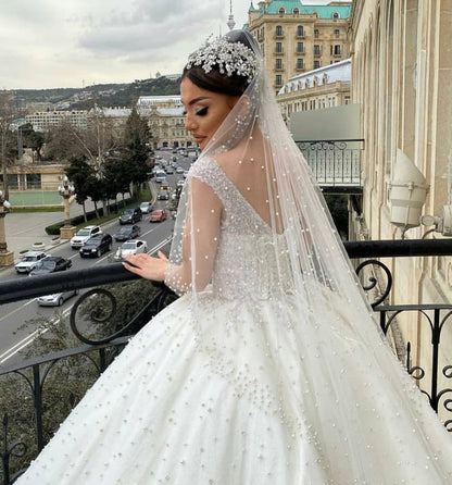 Elegant Off-the-Shoulder Backless Wedding Dress with Pearl Beading