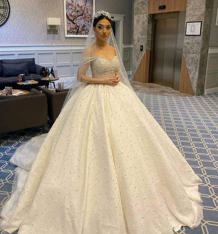 Elegant Off-the-Shoulder Backless Wedding Dress with Pearl Beading