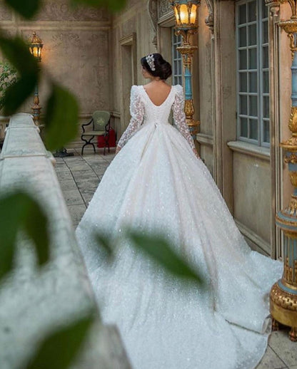 Glamorous Deep V-Neck Long Sleeve Train Wedding Dress with Lace Appliques