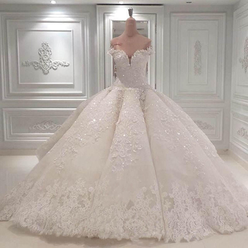 Glamorous Off-the-Shoulder Ball Gown Wedding Dress With Beadings
