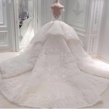 Glamorous Off-the-Shoulder Ball Gown Wedding Dress With Beadings