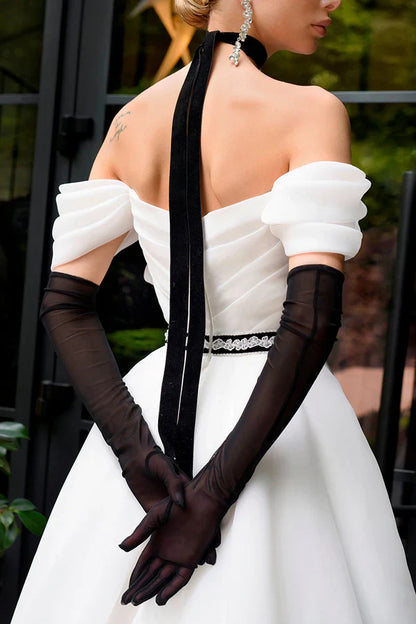A Line strapless organza ivory rustic wedding dress paired with court train
