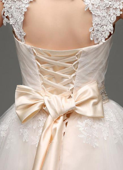Tulle Cap Sleeves Keyhole Back Princess Wedding Dress With Bow And Rhinestone Sash